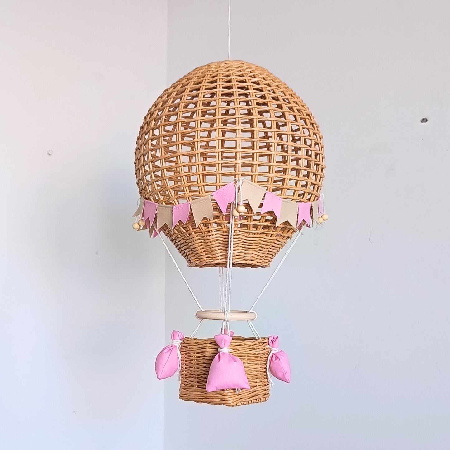Decorative hot air balloon with basket for a girl's room