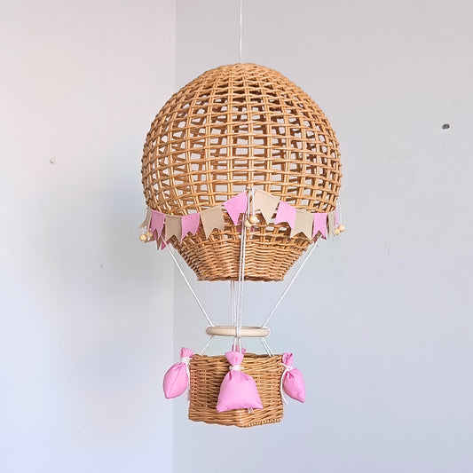 Decorative hot air balloon with basket for a girl's room